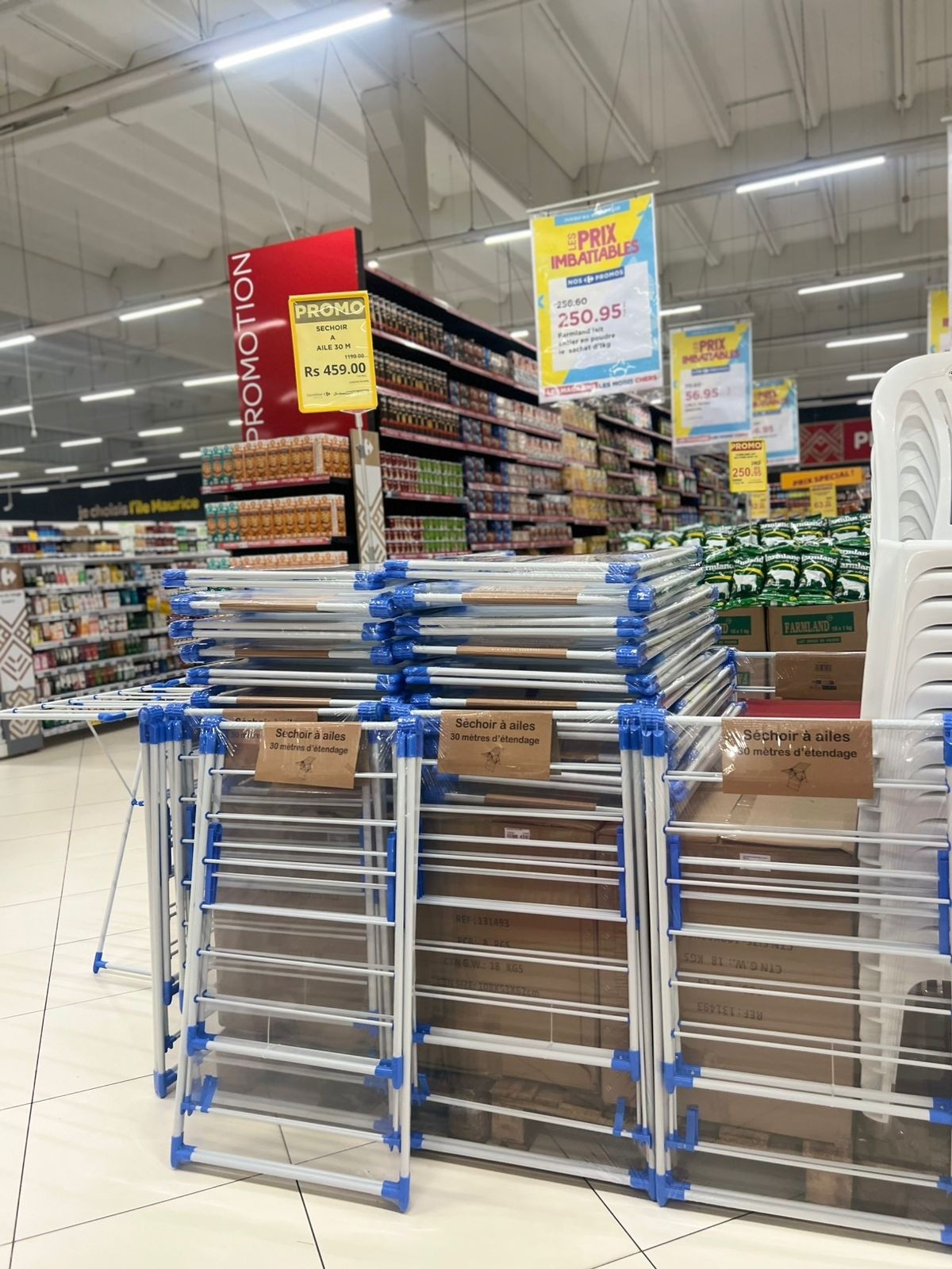 May be an image of timber yard and text