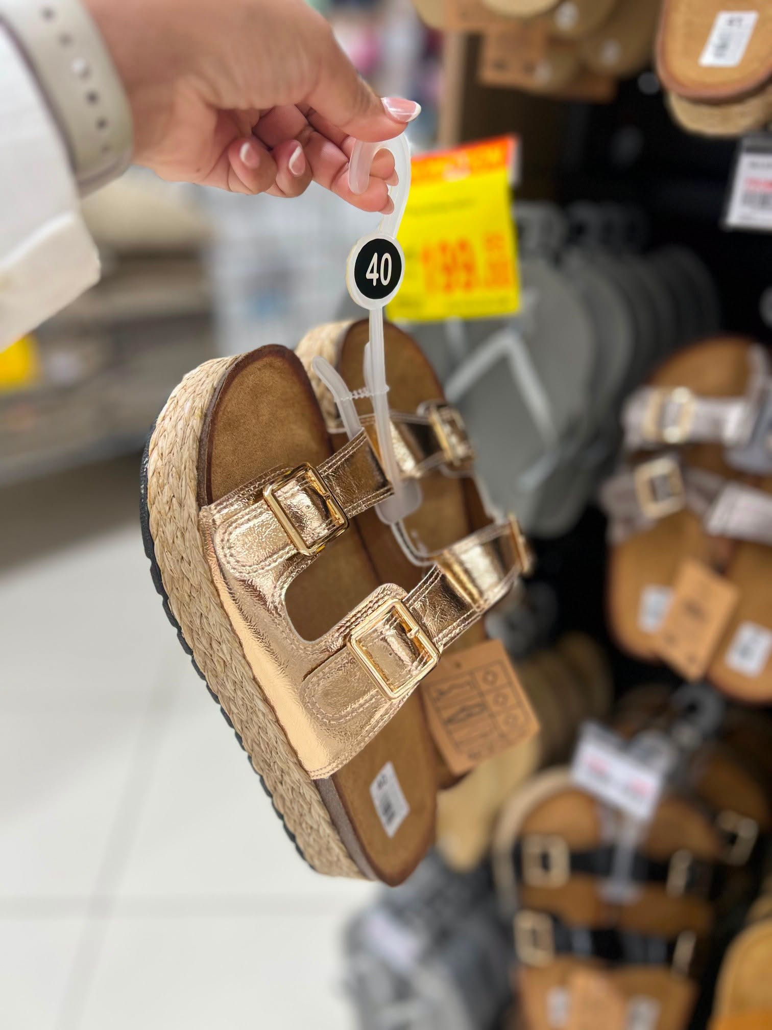 May be an image of espadrilles and text